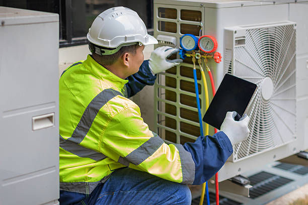 Professional Hvac technician working in Parkville, MD